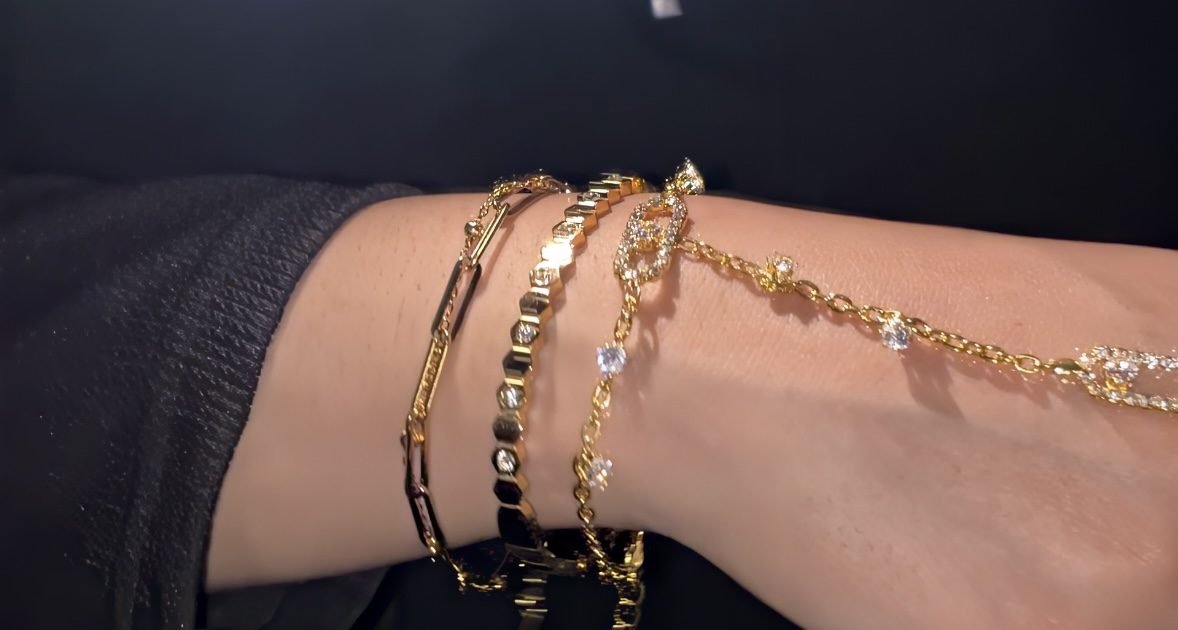 The Luxe Set worn on a hand